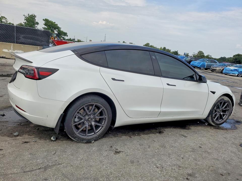 Снимка 3 от търг – 2021 TESLA MODEL 3 с VIN 5YJ3E1EA0MF853737