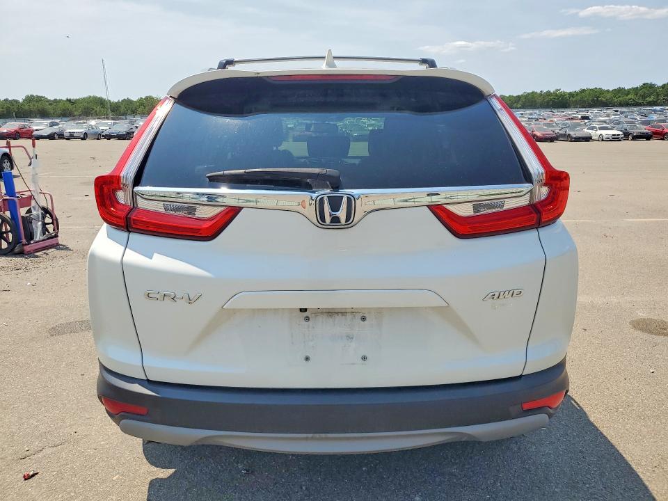 Photo 6 from auction – 2017 HONDA CR-V with VIN 2HKRW2H87HH678531