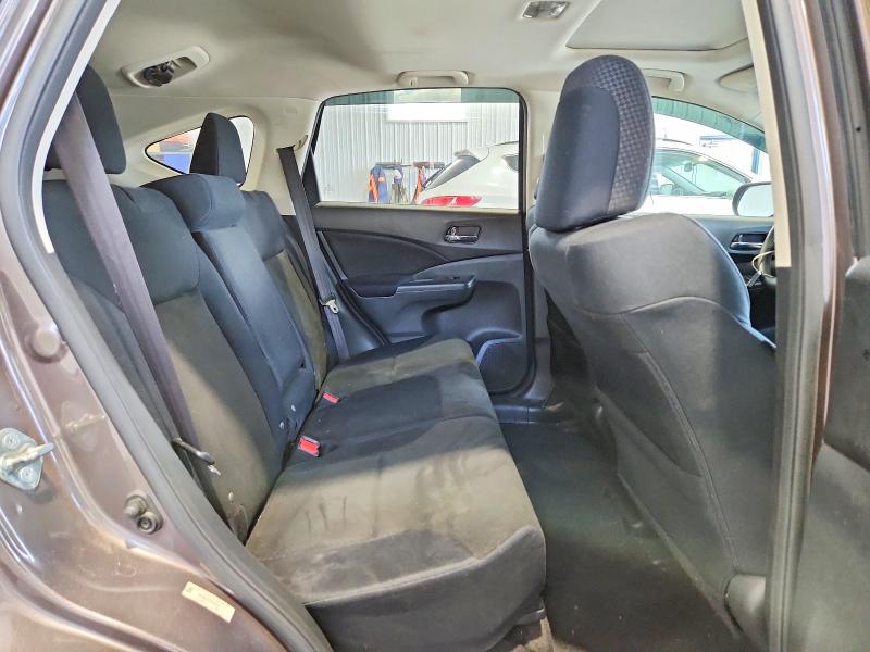 Photo 11 from auction – 2015 HONDA CR-V with VIN 2HKRM4H57FH649292