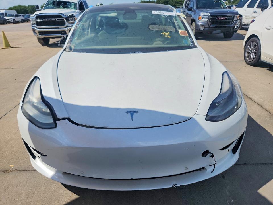 Photo 5 from auction – 2021 TESLA MODEL 3 with VIN 5YJ3E1EA1MF996096