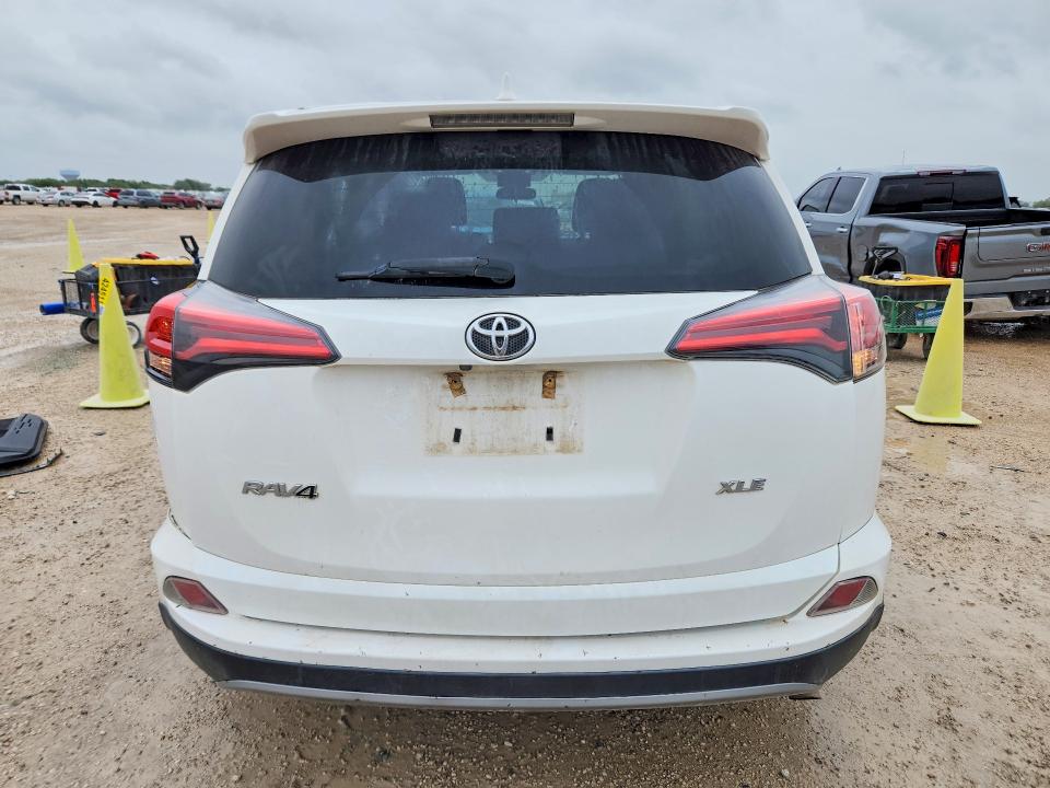 Photo 6 from auction – 2018 TOYOTA RAV4 with VIN 2T3WFREV4JW467761