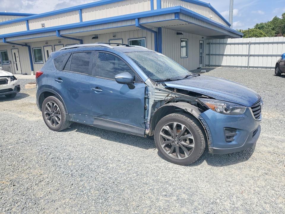 Photo 4 from auction – 2016 MAZDA CX-5 with VIN JM3KE2DY1G0668204