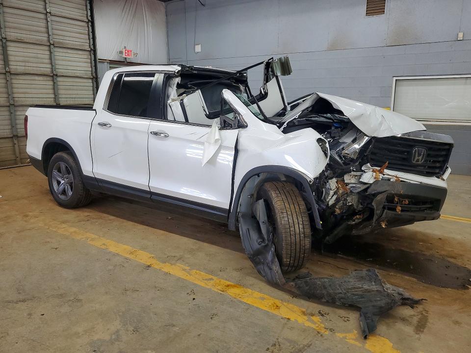 Photo 4 from auction – 2021 HONDA RIDGELINE with VIN 5FPYK3F53MB006407