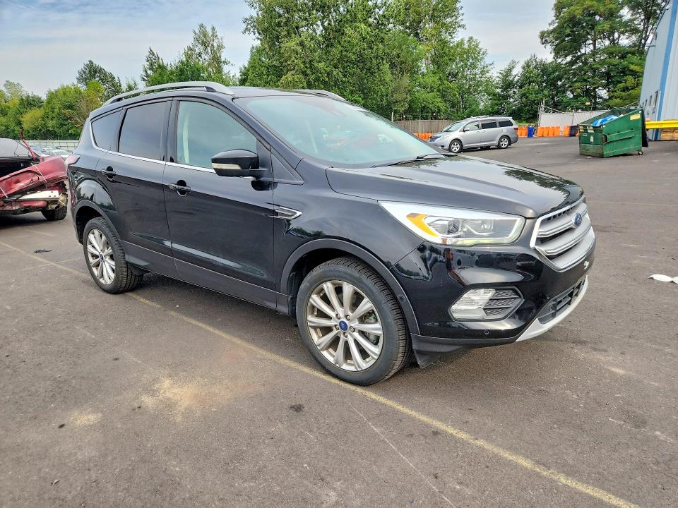 Photo 4 from auction – 2017 FORD ESCAPE with VIN 1FMCU9JD0HUB08223