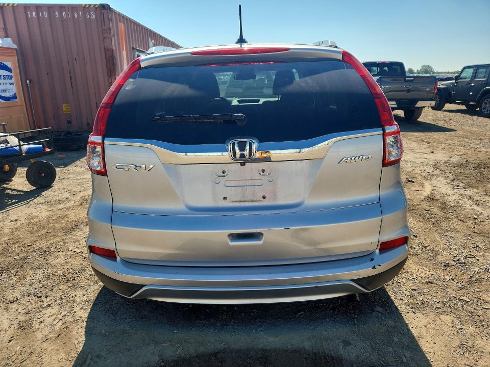 Photo 6 from auction – 2016 HONDA CR-V with VIN 5J6RM4H72GL135214