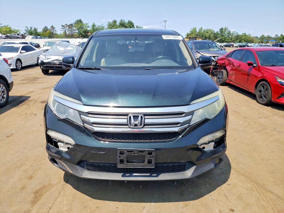 Photo 5 from auction – 2016 HONDA PILOT with VIN 5FNYF6H59GB040657