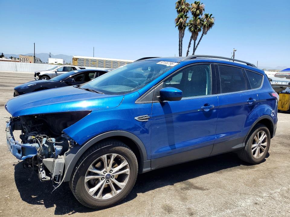 FORD ESCAPE 2018 with VIN 1FMCU0HD7JUB16777 - Photo from auction