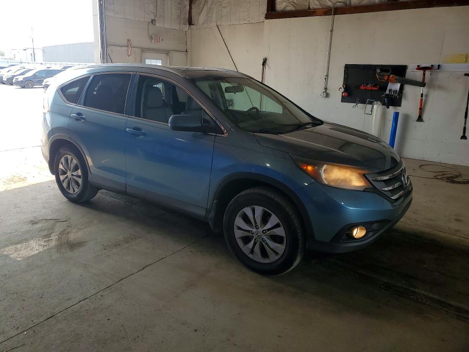 Photo 4 from auction – 2014 HONDA CR-V with VIN 2HKRM3H73EH506558