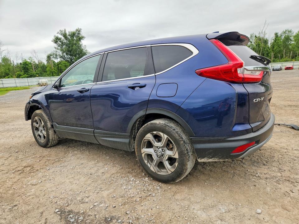 Photo 2 from auction – 2018 HONDA CR-V with VIN 7FARW2H85JE080107