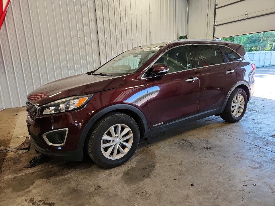 KIA SORENTO 2018 with VIN 5XYPGDA55JG338887 - Photo from auction