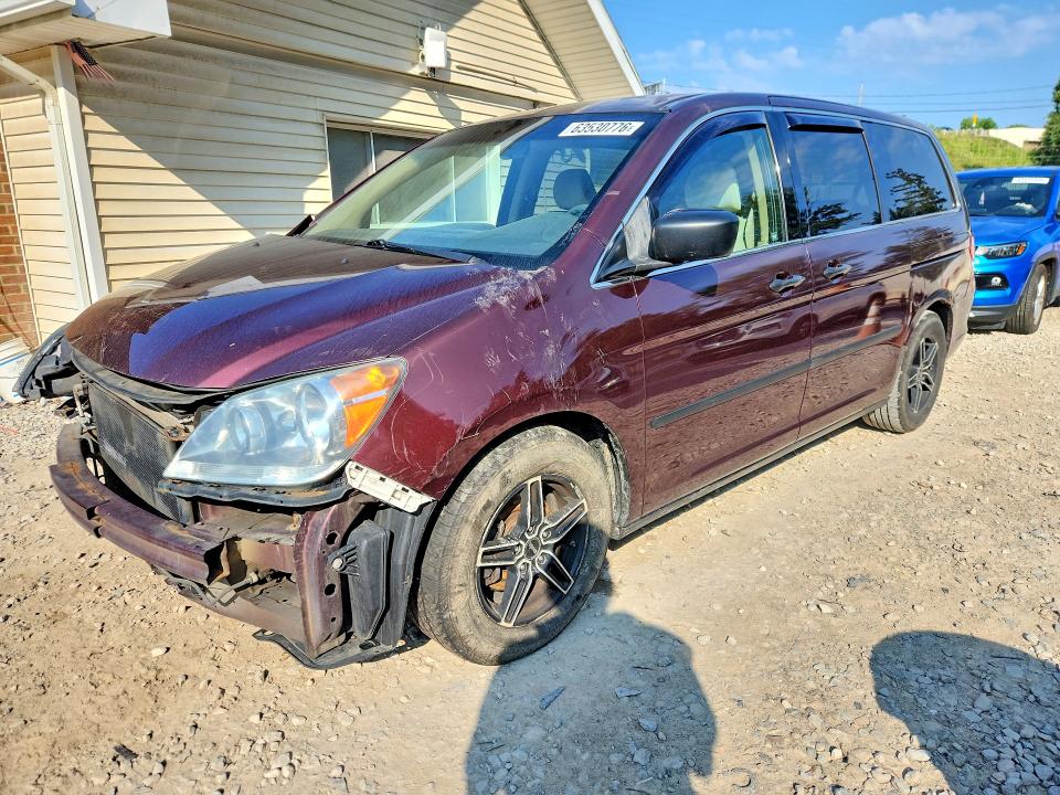 HONDA ODYSSEY 2009 with VIN 5FNRL382X9B044995 - Photo from auction