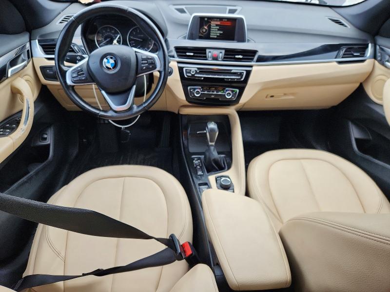 Photo 8 from auction – 2017 BMW X1 with VIN WBXHT3C39H5F87109