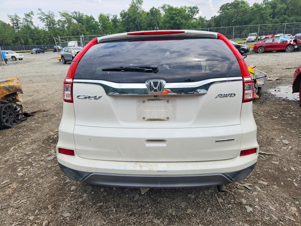 Photo 6 from auction – 2016 HONDA CR-V with VIN 5J6RM4H47GL049256