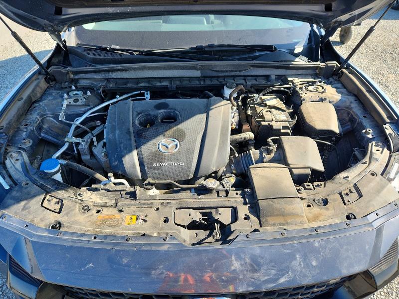 Photo 12 from auction – 2024 MAZDA CX-50 with VIN 7MMVABBMXRN238632