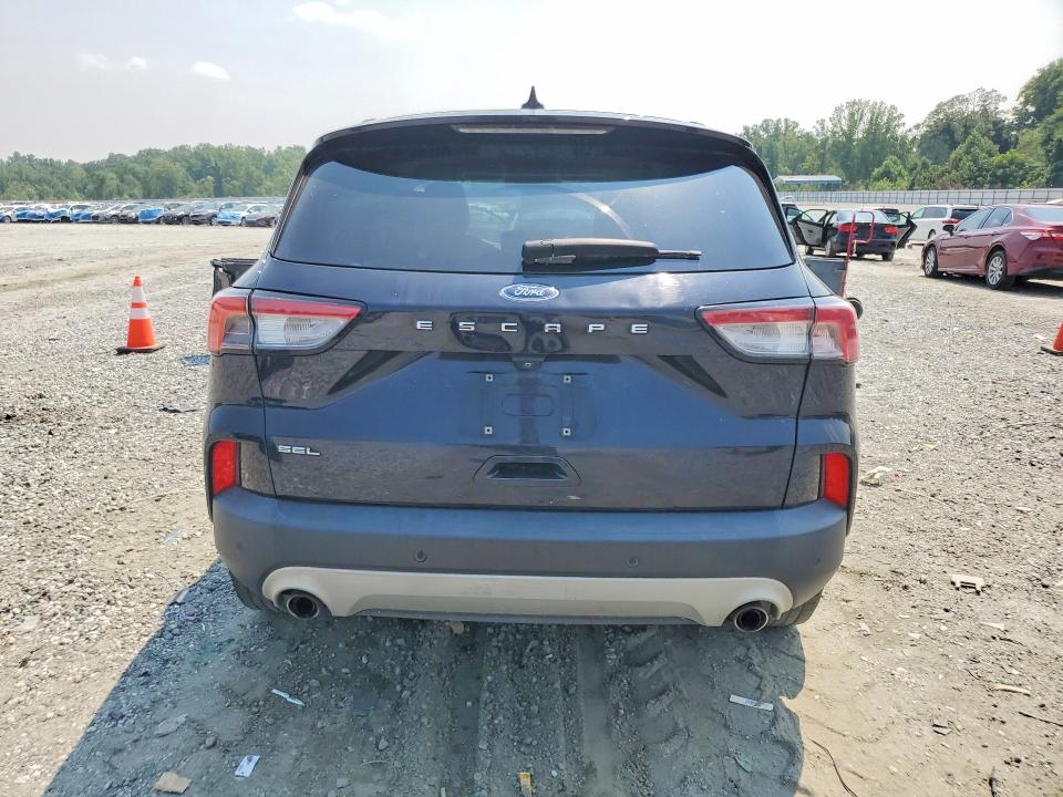Photo 6 from auction – 2021 FORD ESCAPE with VIN 1FMCU0H68MUA63402