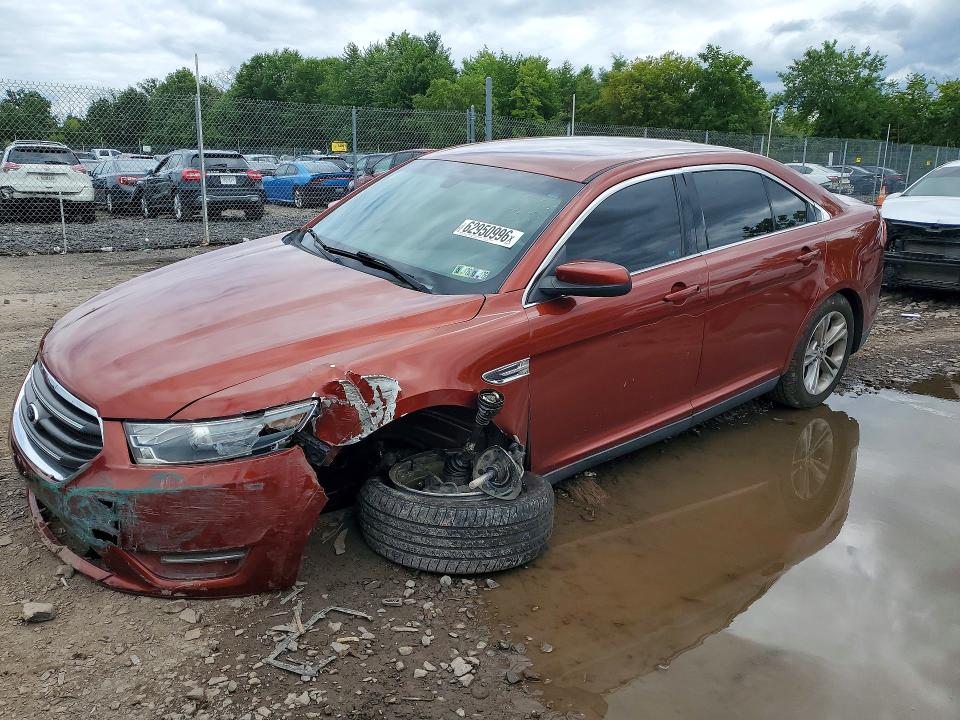 FORD TAURUS 2014 with VIN 1FAHP2H85EG110275 - Photo from auction