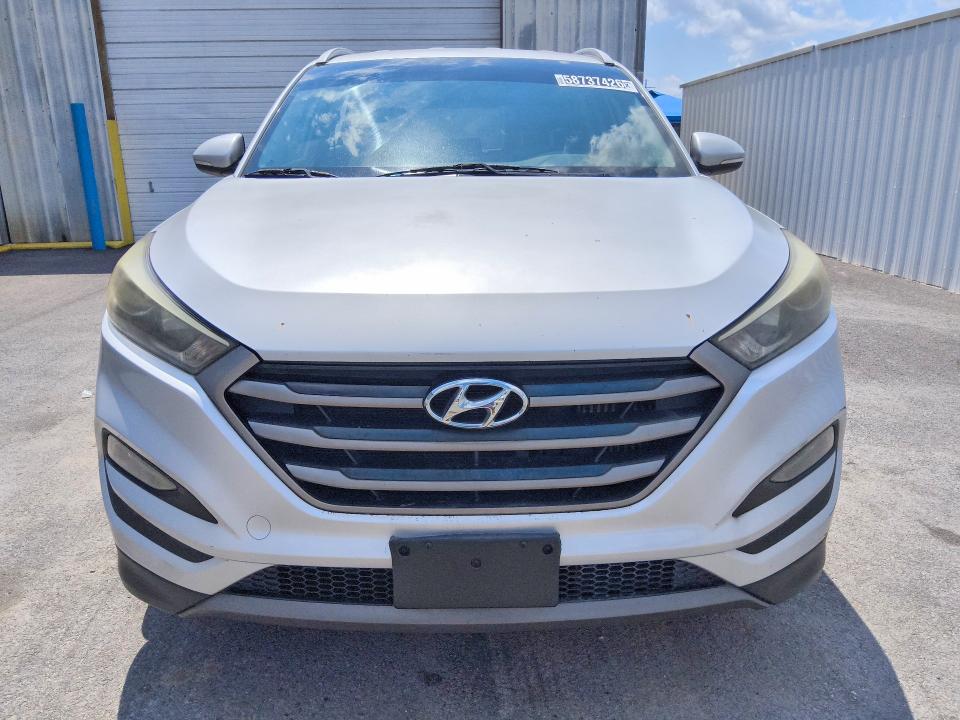 Photo 5 from auction – 2016 HYUNDAI TUCSON with VIN KM8J33A23GU029035