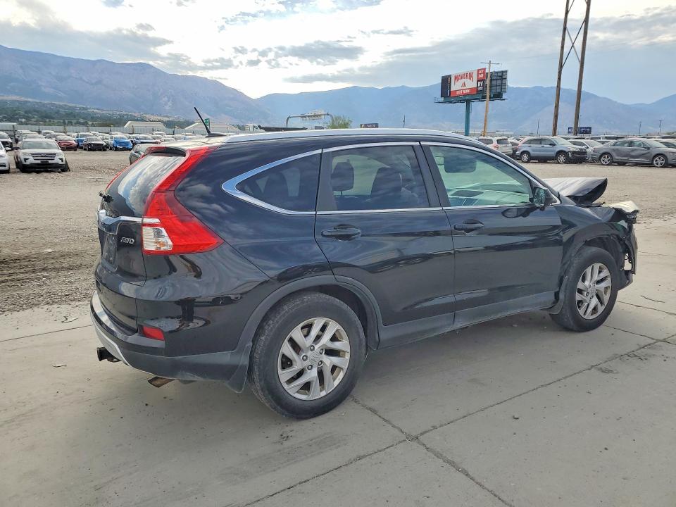 Photo 3 from auction – 2015 HONDA CR-V with VIN 2HKRM4H71FH659687