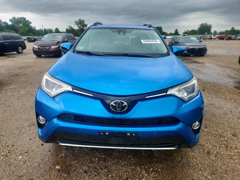 Photo 5 from auction – 2018 TOYOTA RAV4 with VIN JTMRFREV7JJ723127
