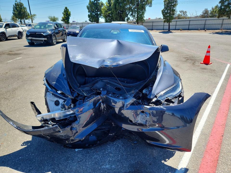 Photo 5 from auction – 2024 TESLA MODEL 3 with VIN 5YJ3E1EB8RF732633