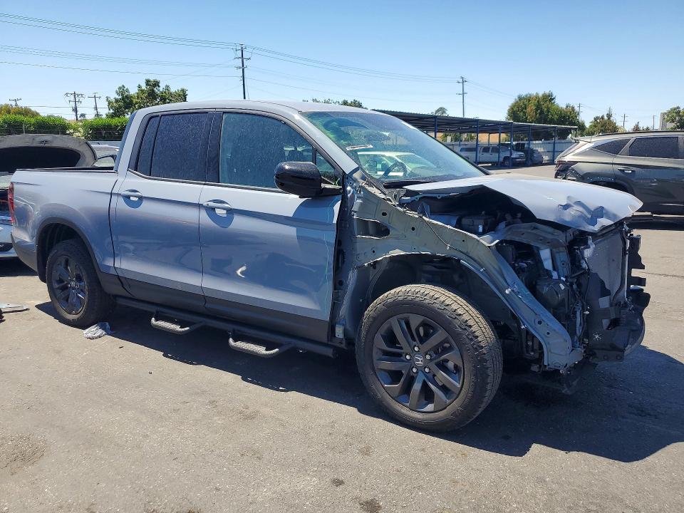 Photo 4 from auction – 2025 HONDA RIDGELINE with VIN 5FPYK3F16SB038245