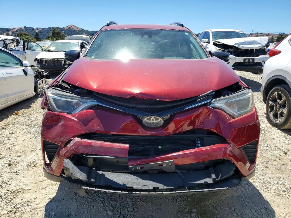 Photo 5 from auction – 2018 TOYOTA RAV4 with VIN JTMZFREV8JD109556