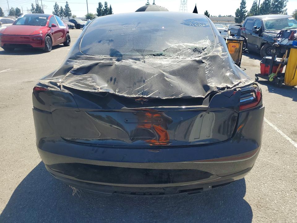 Снимка 6 от търг – 2023 TESLA MODEL 3 с VIN 5YJ3E1EA0PF591335