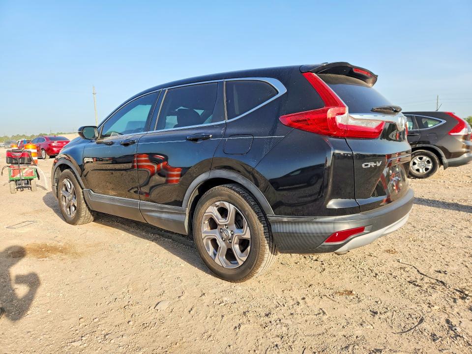 Photo 2 from auction – 2018 HONDA CR-V with VIN 7FARW1H83JE017839