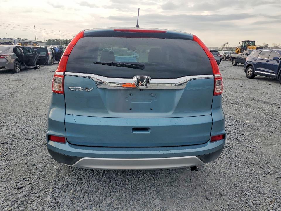 Photo 6 from auction – 2016 HONDA CRV with VIN 2HKRM3H59GH539890