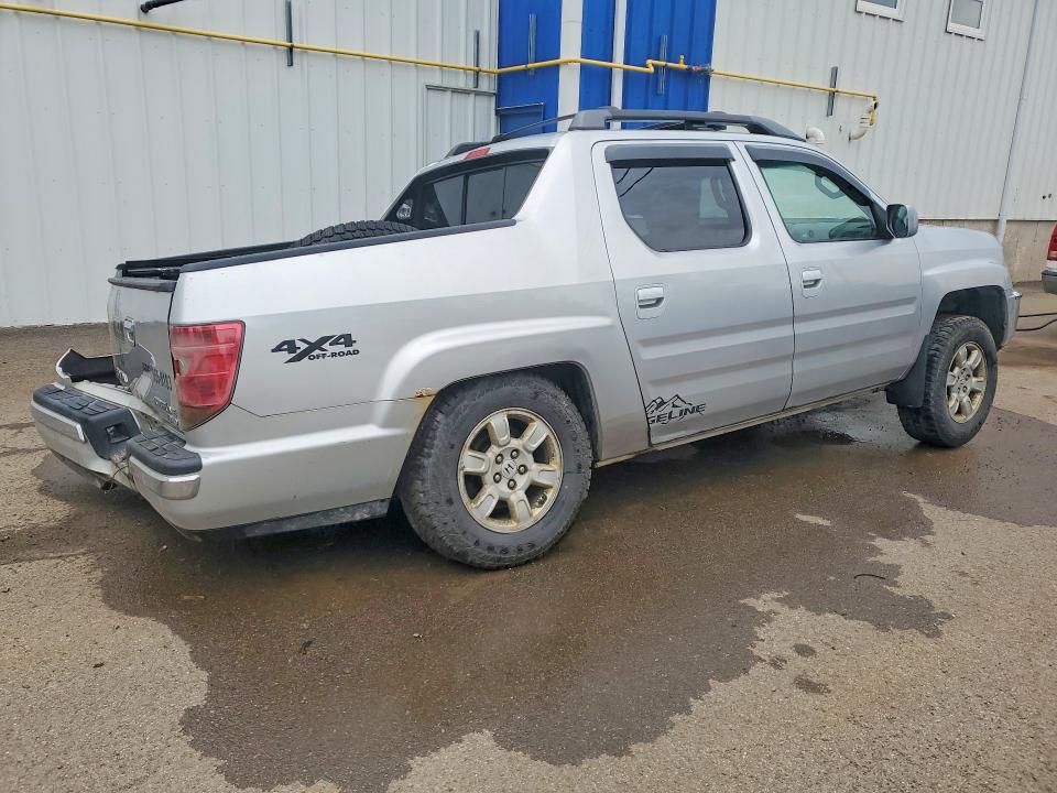 Photo 3 from auction – 2010 HONDA RIDGELINE with VIN 5FPYK1F58AB503808