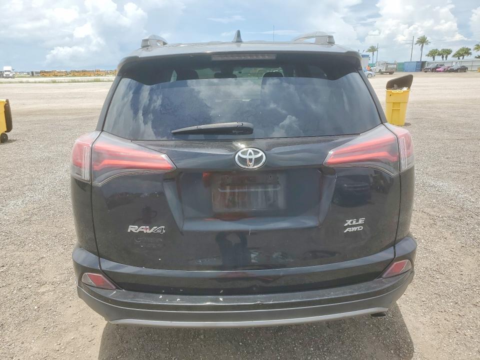 Photo 6 from auction – 2018 TOYOTA RAV4 with VIN 2T3RFREV0JW808165