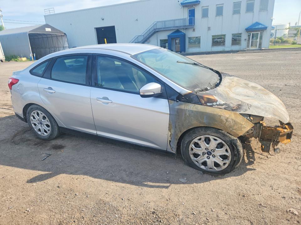 Photo 4 from auction – 2013 FORD FOCUS with VIN 1FADP3F27DL238204