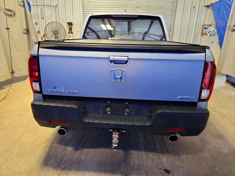 Photo 6 from auction – 2022 HONDA RIDGELINE with VIN 5FPYK3F75NB017816