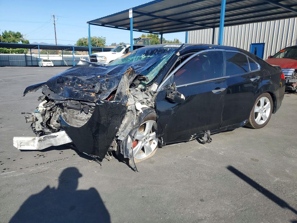 ACURA TSX 2010 with VIN JH4CU2F63AC030990 - Photo from auction