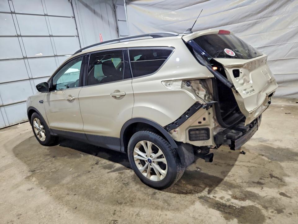 Photo 2 from auction – 2018 FORD ESCAPE with VIN 1FMCU9HD2JUD12467