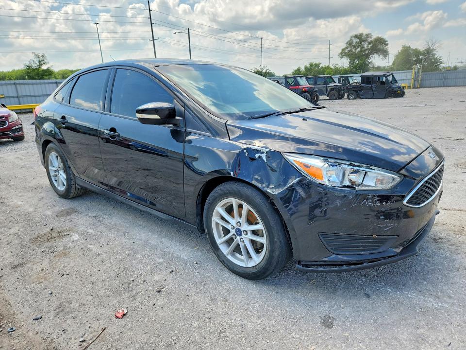 Photo 4 from auction – 2015 FORD FOCUS with VIN 1FADP3F25FL255652