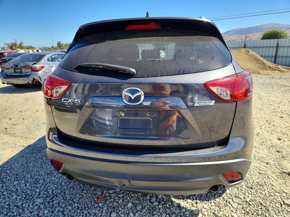 Photo 6 from auction – 2016 MAZDA CX-5 with VIN JM3KE2CY0G0854270