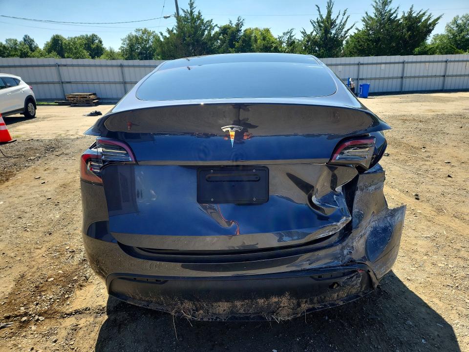 Снимка 6 от търг – 2023 TESLA MODEL Y с VIN 7SAYGDED0PF923451
