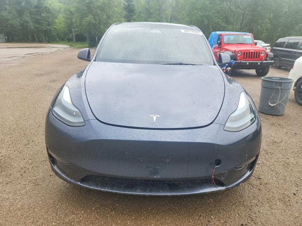 Photo 5 from auction – 2023 TESLA MODEL Y with VIN LRWYGDFD3PC019373