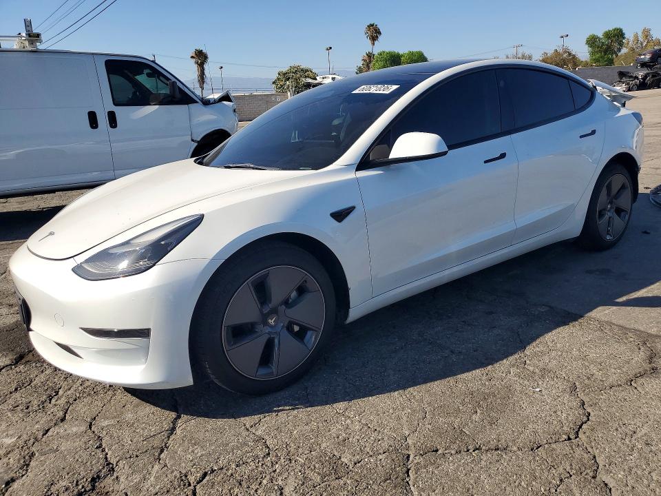 TESLA MODEL 3 2023 with VIN 5YJ3E1EA3PF489284 - Photo from auction