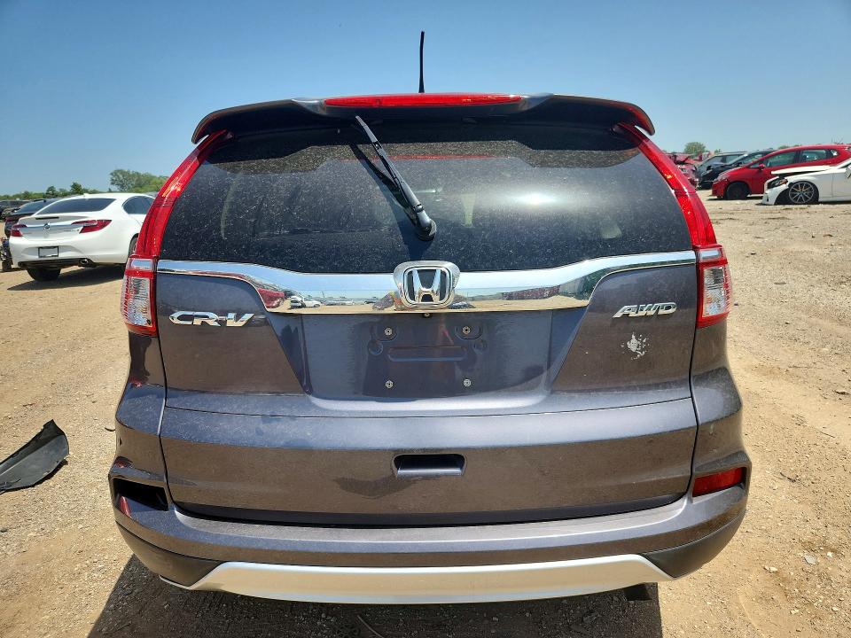 Photo 6 from auction – 2015 HONDA CR-V with VIN 5J6RM4H77FL081858