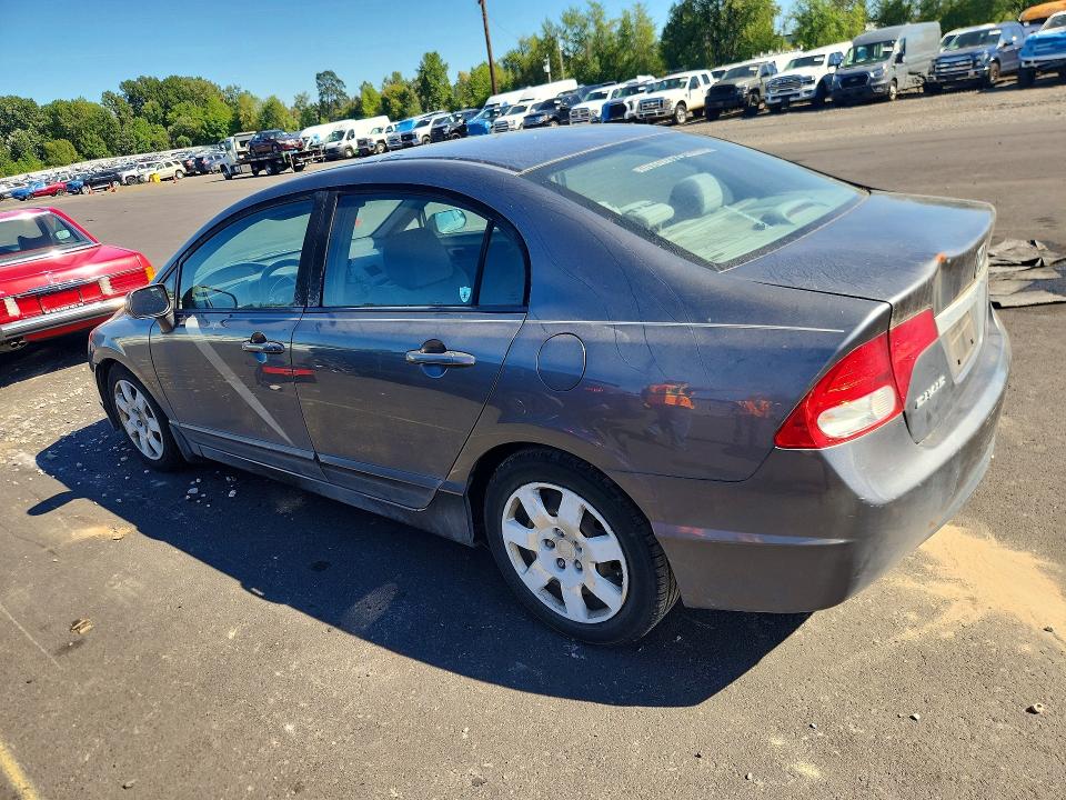Photo 2 from auction – 2011 HONDA CIVIC with VIN 19XFA1F58BE021348