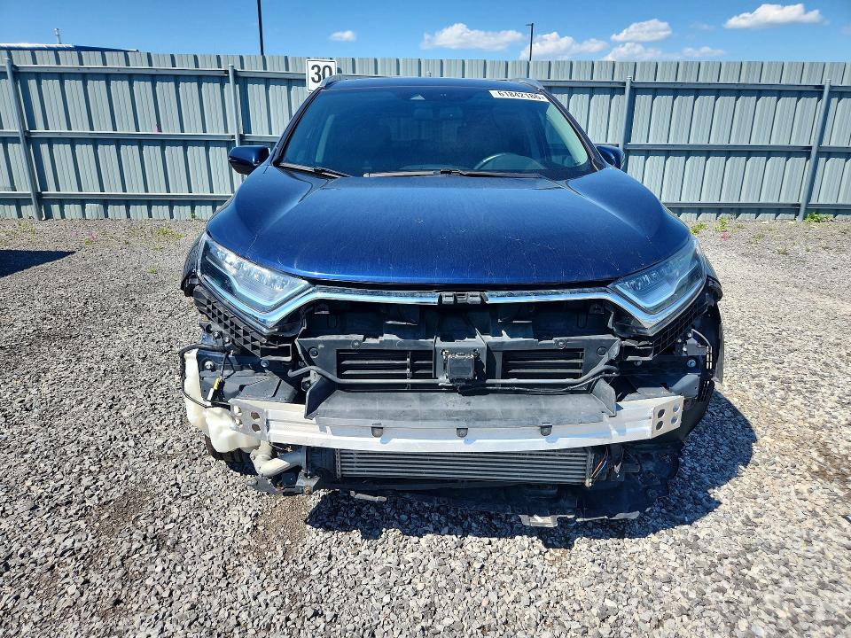 Photo 5 from auction – 2018 HONDA CR-V with VIN 2HKRW2H97JH101609
