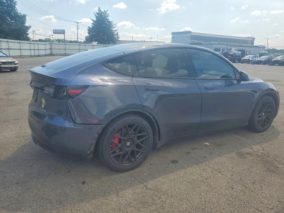 Photo 3 from auction – 2022 TESLA MODEL Y with VIN 7SAYGDEF2NF399024