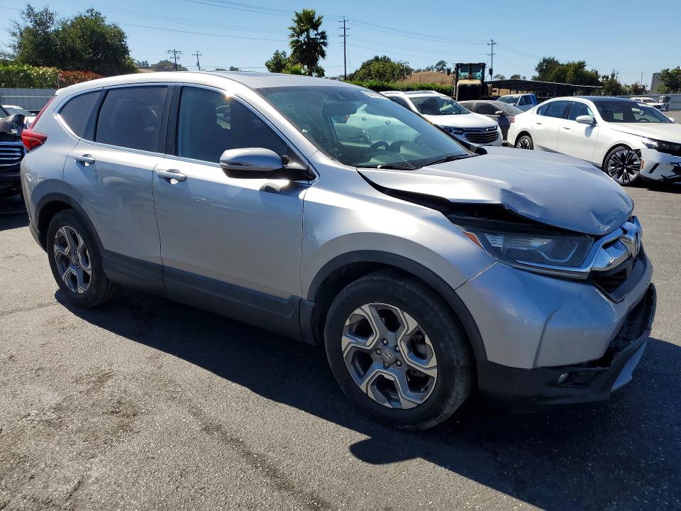 Photo 4 from auction – 2017 HONDA CR-V with VIN 7FARW1H88HE043153
