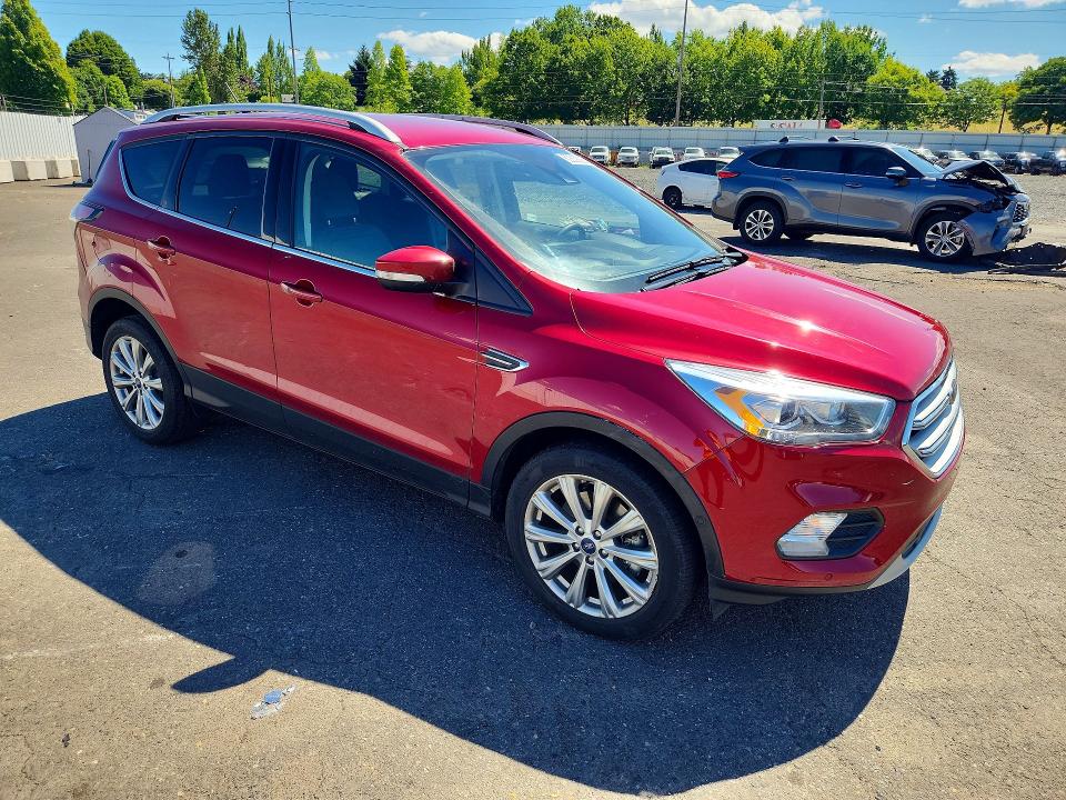 Photo 4 from auction – 2018 FORD ESCAPE with VIN 1FMCU0J95JUA04792