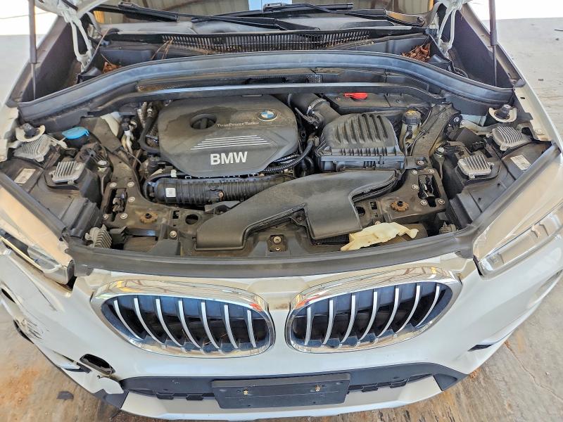 Photo 11 from auction – 2016 BMW X1 with VIN WBXHT3C34G5E56474