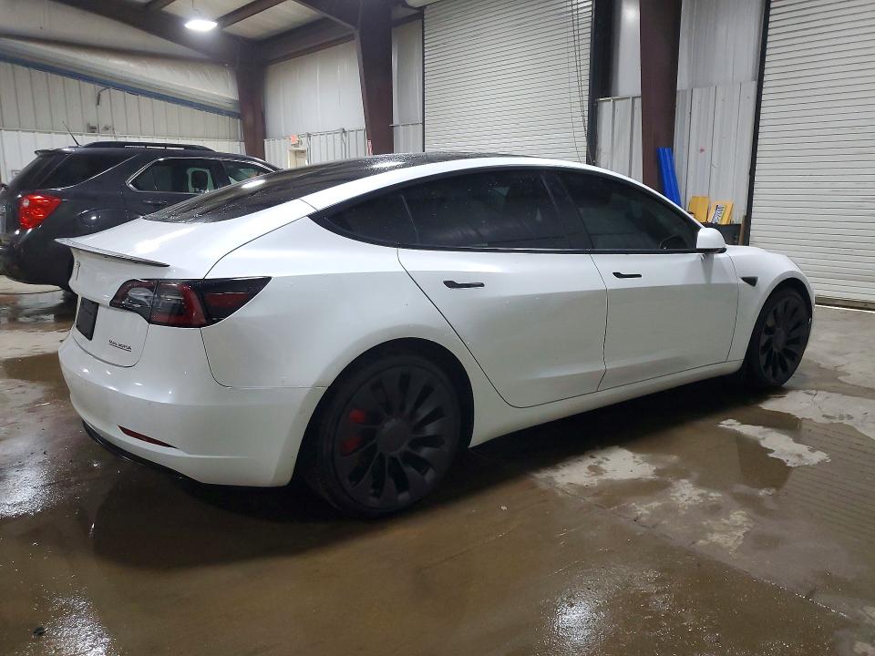 Photo 3 from auction – 2022 TESLA MODEL 3 with VIN 5YJ3E1EC7NF295288