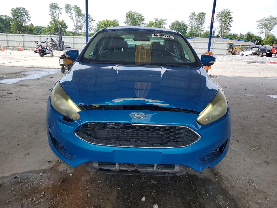 Photo 5 from auction – 2015 FORD FOCUS with VIN 1FADP3F23FL247159