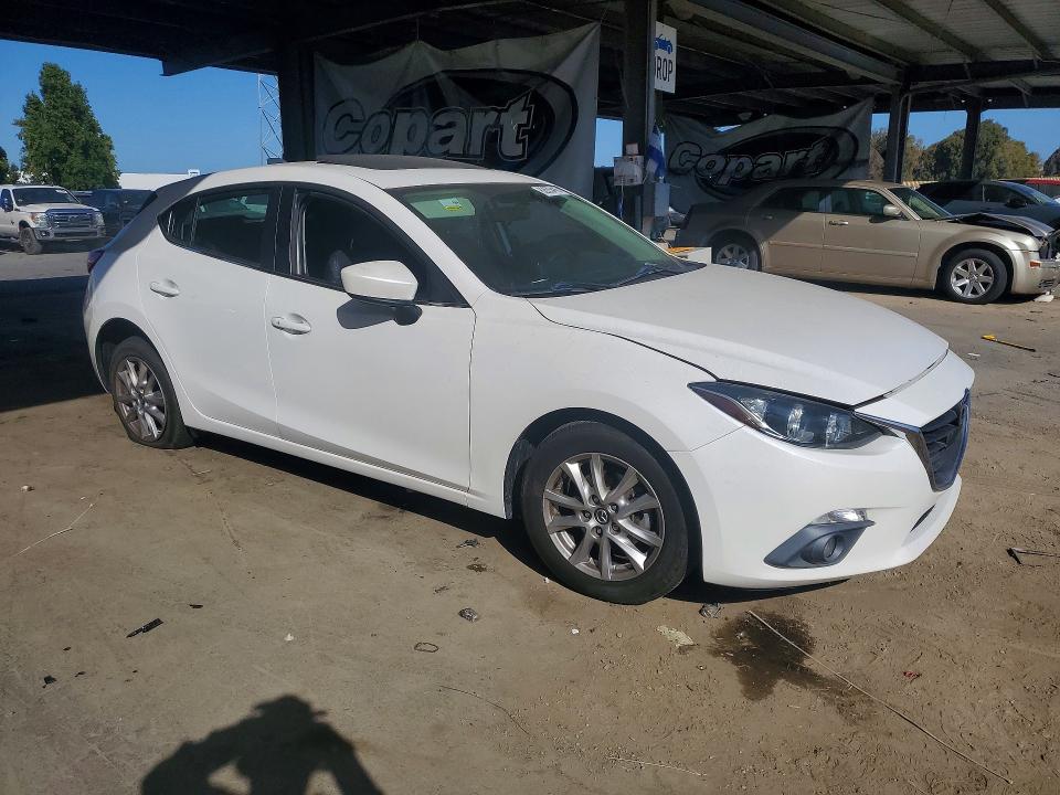 Photo 4 from auction – 2015 MAZDA 3 with VIN 3MZBM1M76FM142656
